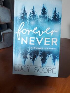 Forever Never by Lucy Score - Blue Paperback Novel (11)